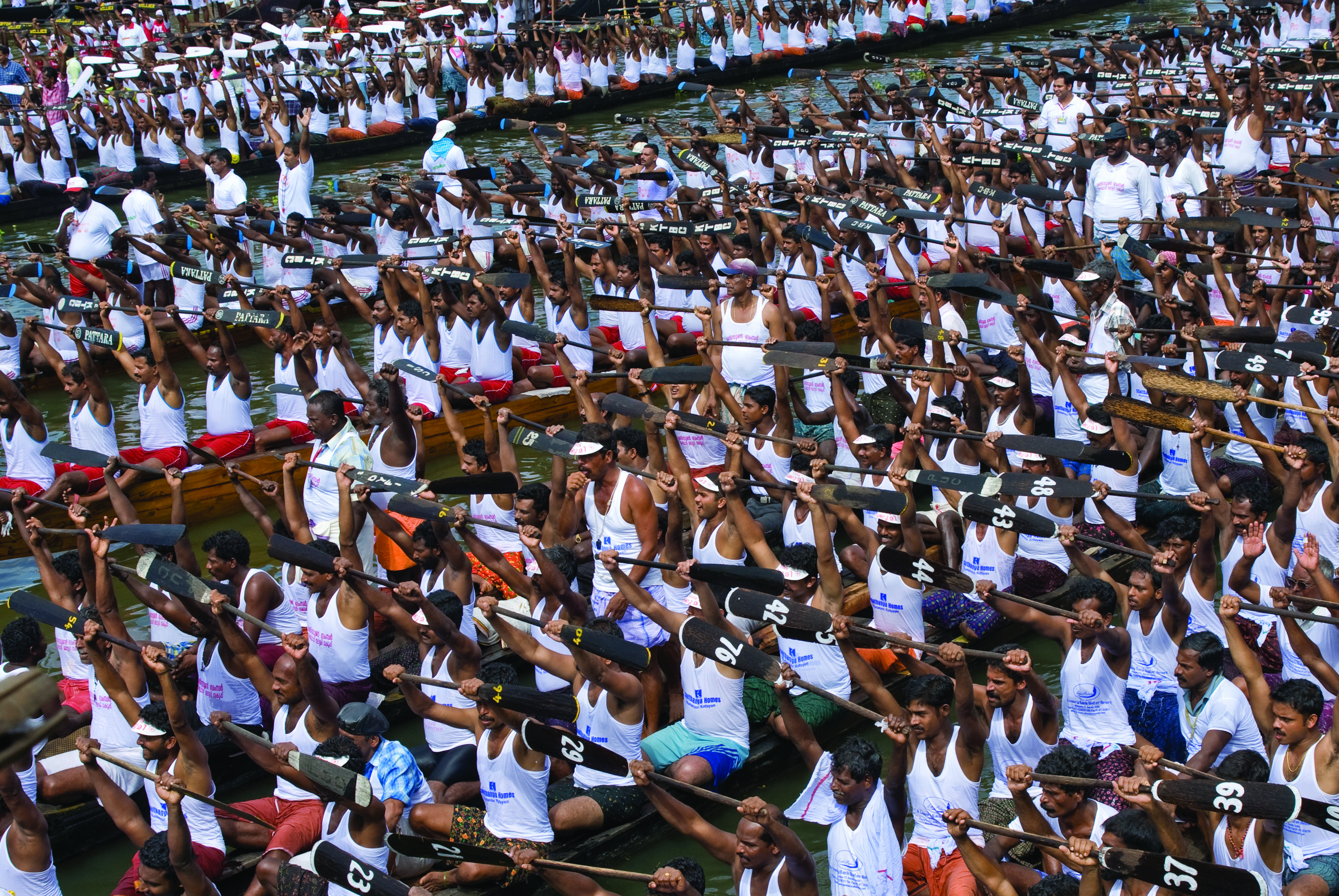 Snake boats racing on Kerala backwaters during Champakkulam Moolam festival