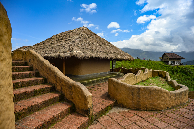 En Ooru tribal heritage village at Pookode Wayanad — traditional tribal huts and cultural centre Kerala