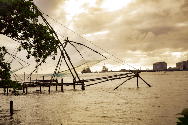 Chinese fishing nets at Fort Kochi, Kerala, silhouetted against the sunset